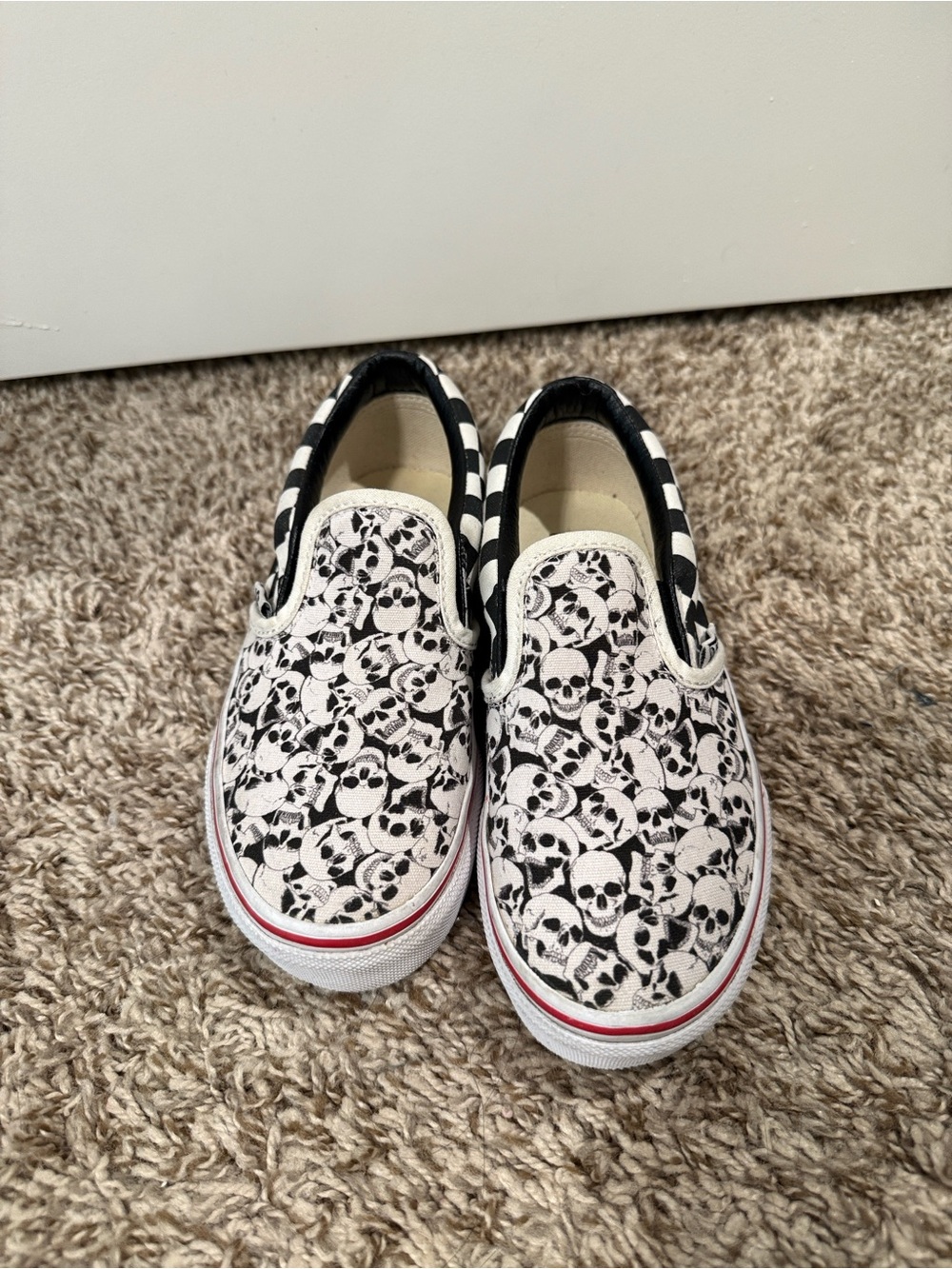 Vans Kids Slip-On Sneakers in Black and White with Skulls. One of a kind!